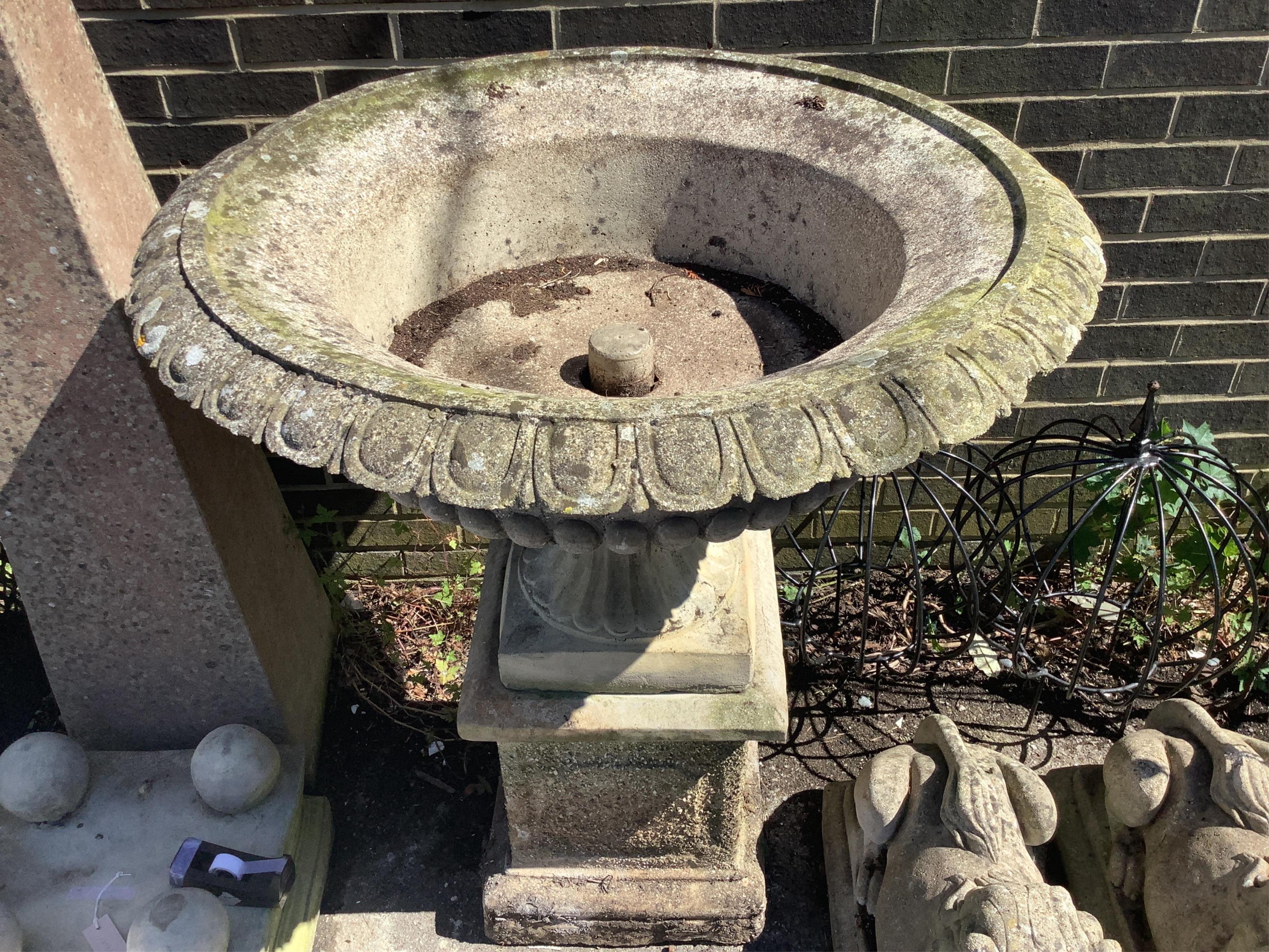 A large reconstituted stone campana garden urn, diameter 95cm, height 110cm. Condition - fair